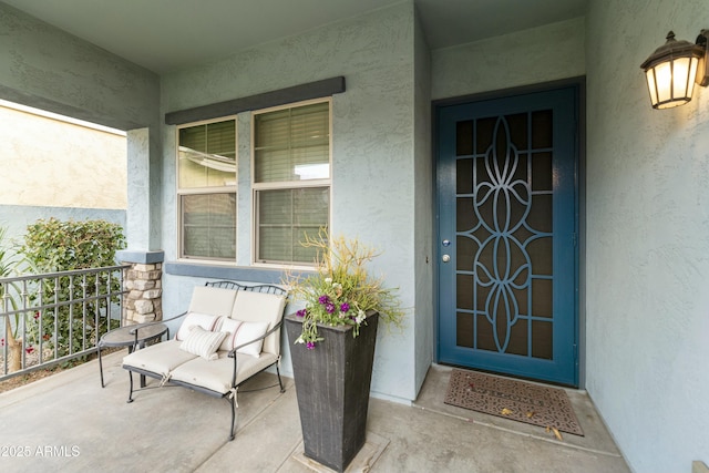 property entrance featuring covered porch