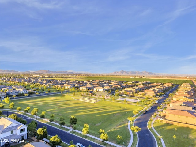 birds eye view of property with a mountain view