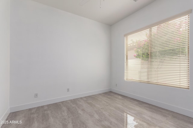 4711 E Buckboard Ct, Gilbert, AZ 85297 - spare room with baseboards and ceiling fan