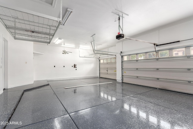 4711 E Buckboard Ct, Gilbert, AZ 85297 - garage with a garage door opener and baseboards