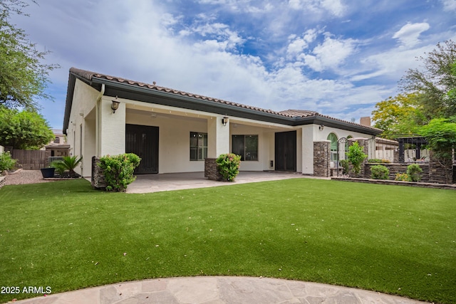 4711 E Buckboard Ct, Gilbert, AZ 85297 - rear view of house featuring a patio area, a tile roof, and stucco siding