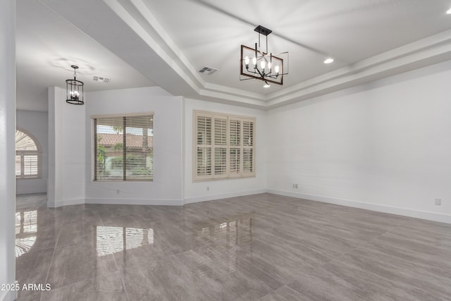 4711 E Buckboard Ct, Gilbert, AZ 85297 - spare room featuring a chandelier, baseboards, a tray ceiling, and recessed lighting
