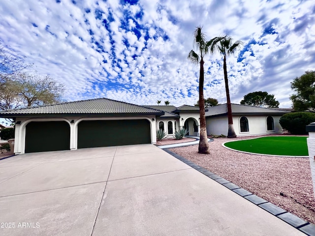 view of front of home with a garage