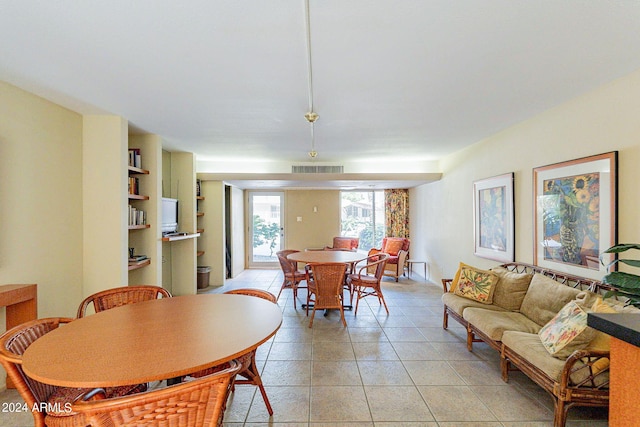 dining room with light tile patterned floors