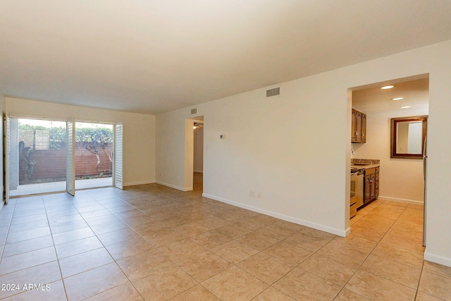 view of tiled spare room