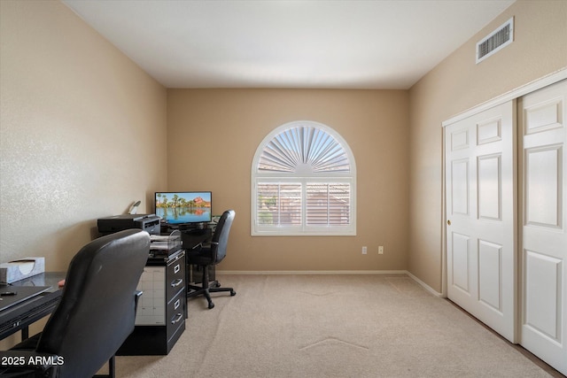 home office featuring visible vents, carpet flooring, and baseboards