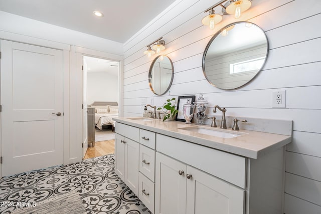 bathroom with vanity and tile patterned floors