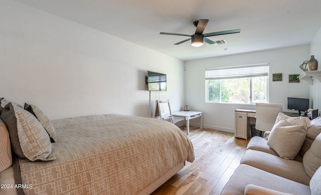 bedroom featuring ceiling fan and light wood-type flooring