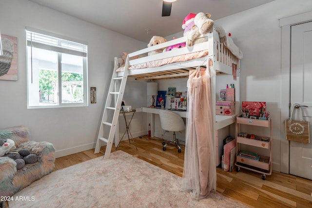 bedroom with light hardwood / wood-style floors