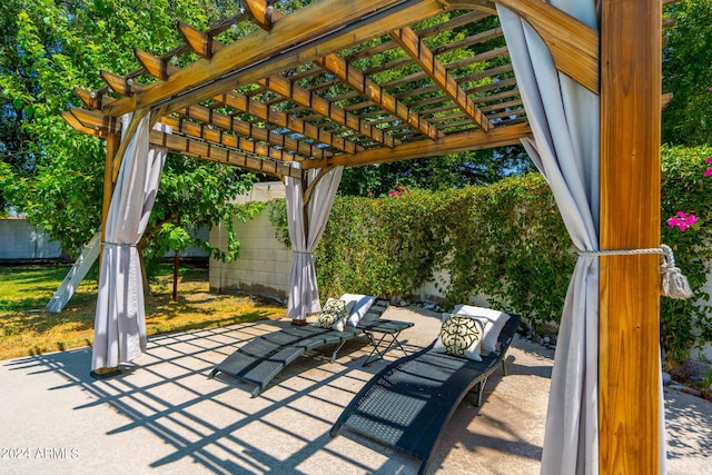 view of patio featuring a pergola