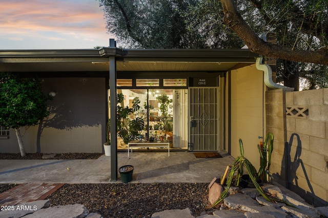 1101 E Bethany Home Rd Unit 1, Phoenix, AZ 85014 - doorway to property featuring concrete block siding