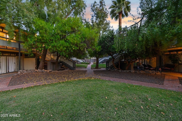 1101 E Bethany Home Rd Unit 1, Phoenix, AZ 85014 - view of grassy yard featuring stairs