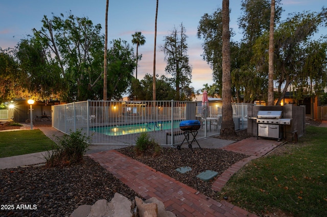 1101 E Bethany Home Rd Unit 1, Phoenix, AZ 85014 - view of swimming pool with grilling area and a patio