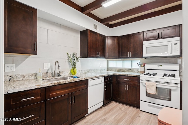 1101 E Bethany Home Rd Unit 1, Phoenix, AZ 85014 - kitchen with white appliances, a sink, light wood-style floors, beam ceiling, and light stone countertops