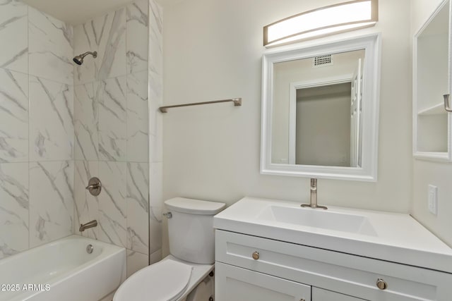 bathroom featuring toilet, washtub / shower combination, visible vents, and vanity