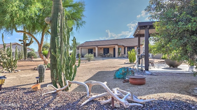 833 N 110th St, Mesa, AZ 85207 - rear view of property with a patio, a tiled roof, and stucco siding