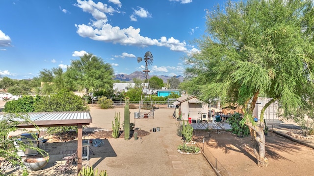 833 N 110th St, Mesa, AZ 85207 - view of property's community featuring a mountain view and a patio