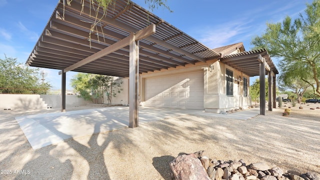 833 N 110th St, Mesa, AZ 85207 - view of patio featuring a garage and a carport