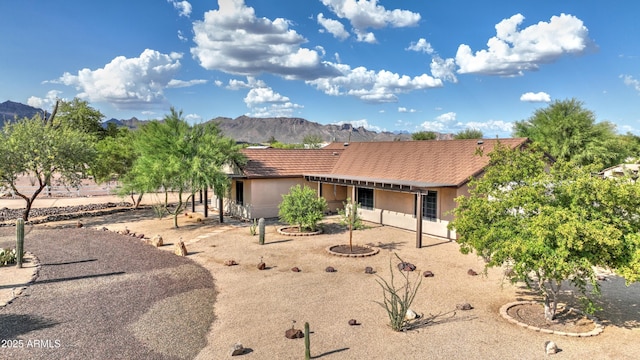 833 N 110th St, Mesa, AZ 85207 - view of front of house featuring a mountain view and stucco siding