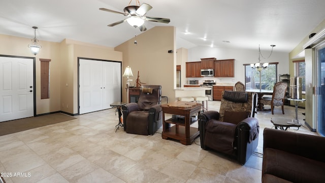 833 N 110th St, Mesa, AZ 85207 - living room featuring lofted ceiling, a chandelier, a ceiling fan, and baseboards