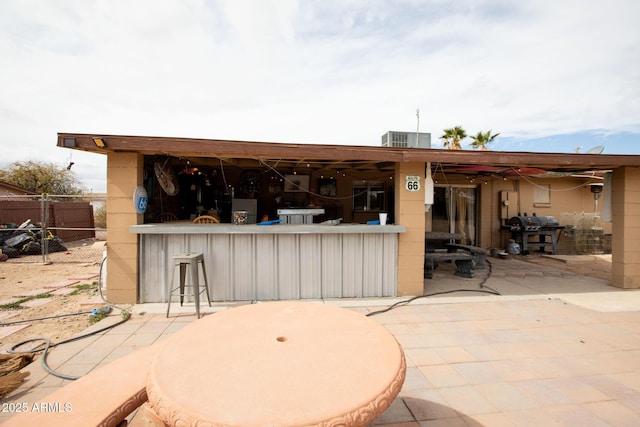 view of patio / terrace with fence and grilling area