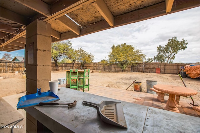 view of patio featuring a fenced backyard