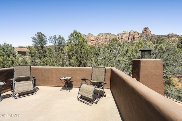 view of patio / terrace with a balcony