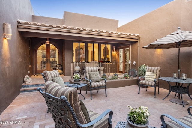 view of patio featuring an outdoor hangout area and french doors