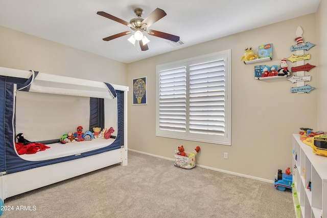 bedroom featuring ceiling fan and light colored carpet