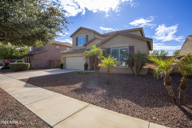 view of front of property with a garage