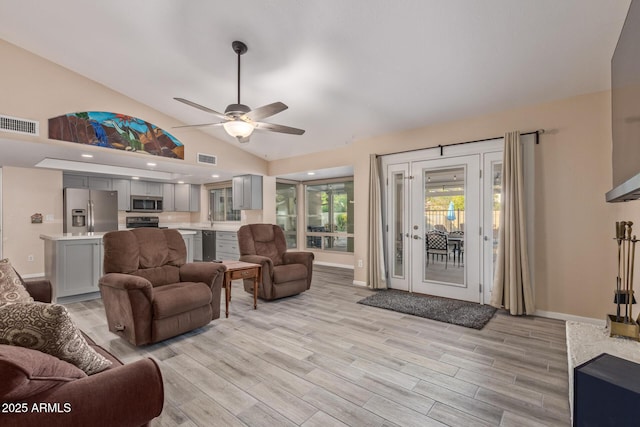 15849 N 46th Pl, Phoenix, AZ 85032 - living area with a ceiling fan, baseboards, light wood-style flooring, and high vaulted ceiling