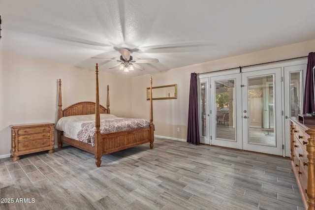 15849 N 46th Pl, Phoenix, AZ 85032 - bedroom with access to outside, wood finished floors, french doors, and baseboards