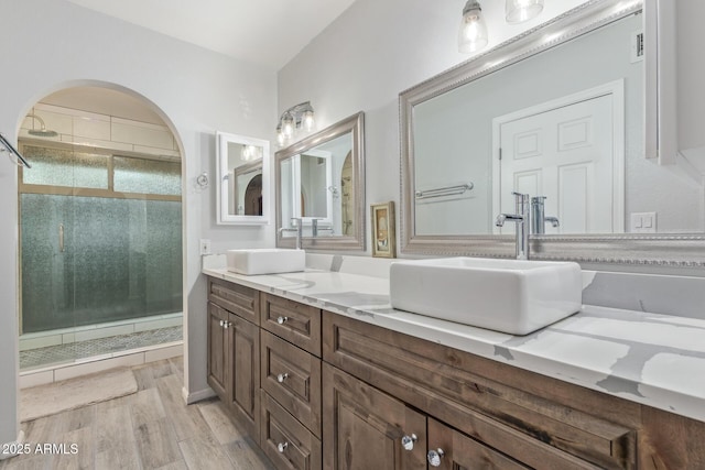 15849 N 46th Pl, Phoenix, AZ 85032 - full bath with a stall shower, wood finished floors, and double vanity