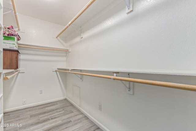 15849 N 46th Pl, Phoenix, AZ 85032 - walk in closet with wood finished floors