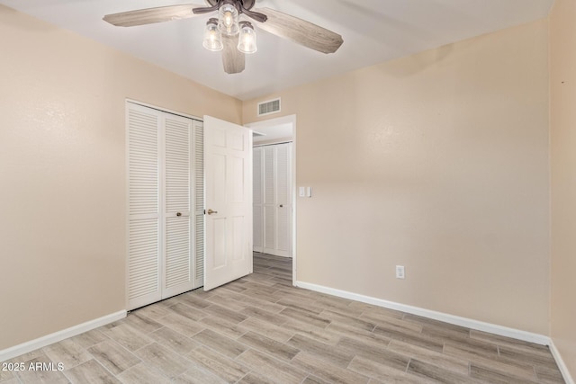 15849 N 46th Pl, Phoenix, AZ 85032 - unfurnished bedroom featuring light wood-style flooring, baseboards, a closet, and ceiling fan
