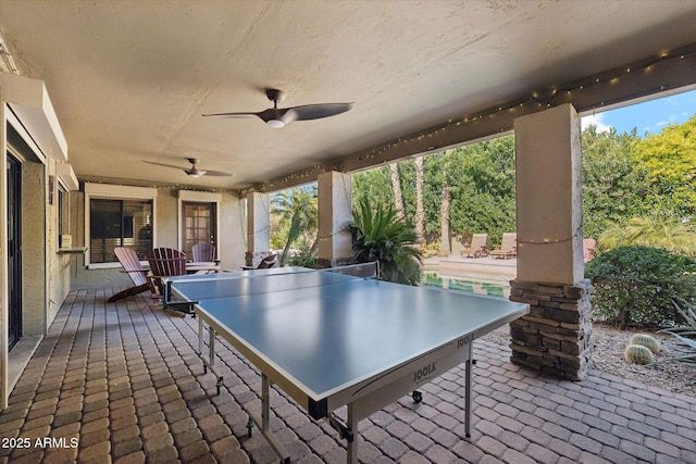 view of patio / terrace featuring ceiling fan