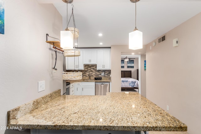 kitchen with backsplash, dishwasher, pendant lighting, kitchen peninsula, and white cabinets