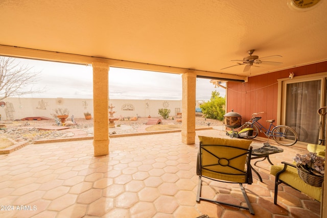 view of patio / terrace featuring ceiling fan