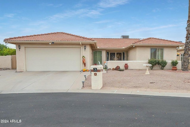 view of front of property featuring a garage