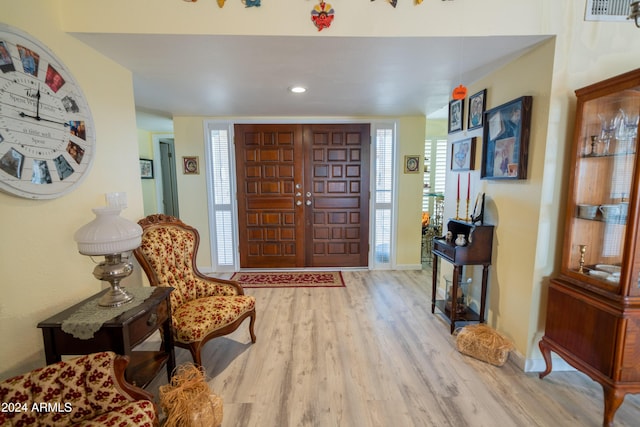 entryway with light wood-type flooring