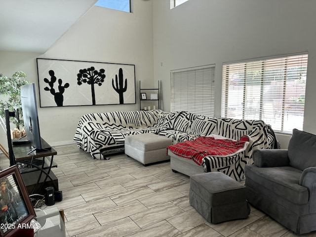 living room featuring a high ceiling