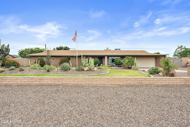 single story home with a garage