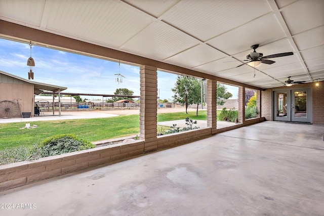 view of patio / terrace with ceiling fan and french doors