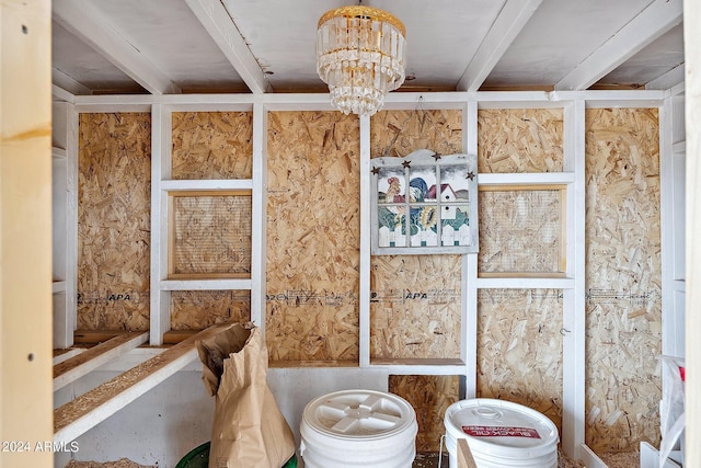 bathroom featuring an inviting chandelier