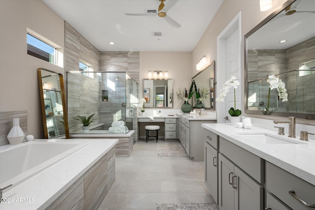 bathroom with vanity, ceiling fan, and independent shower and bath