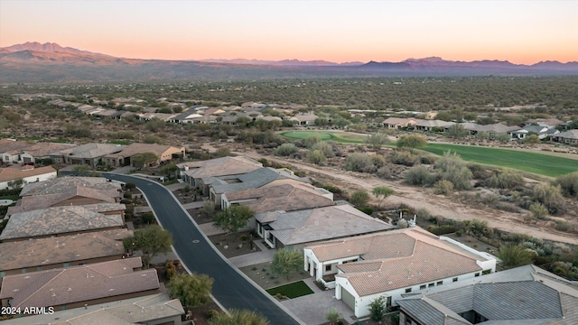 aerial view at dusk with a mountain view