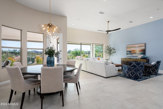 dining space with a chandelier