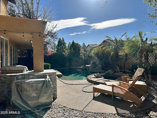 view of patio with a fenced in pool and a fenced backyard