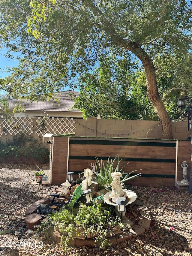 view of yard with fence