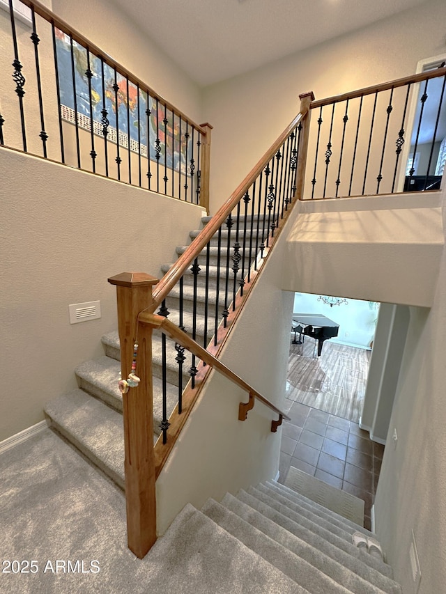 stairs featuring baseboards